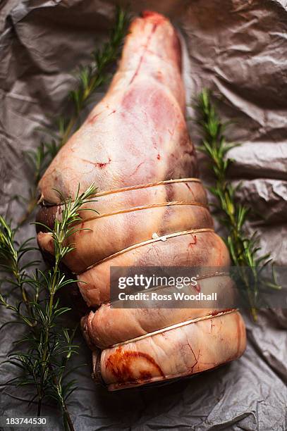 uncooked leg of lamb with rosemary - gigot stock pictures, royalty-free photos & images