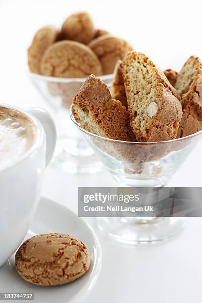 biscotti & amaretti biscuits with coffee cup - biscotti stock pictures, royalty-free photos & images