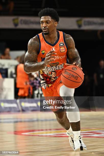 Patrick Miller of the Taipans drives up court during the round 10 NBL match between Cairns Taipans and Sydney Kings at Cairns Convention Centre, on...
