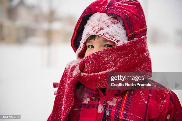 girl wearing coat, scarf and hat with hood - kid in winter coat stock pictures, royalty-free photos & images