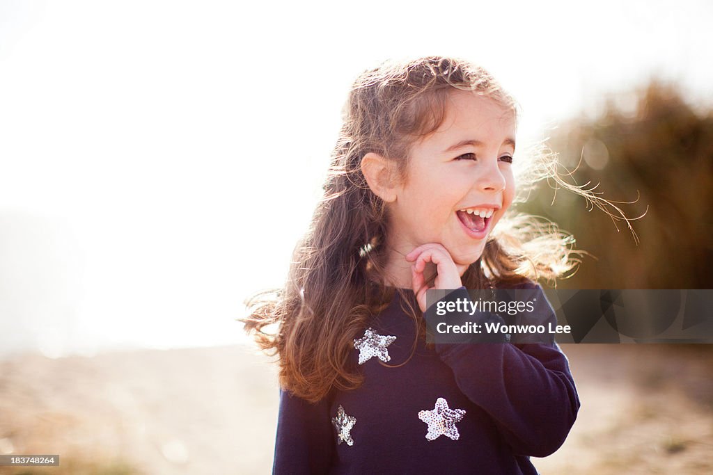 Portrait of girl looking away, laughing