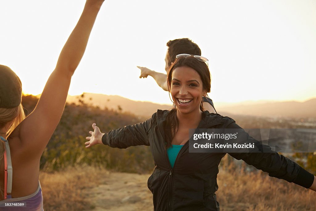 Friends enjoying hillside