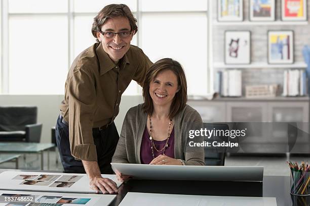 two people looking at camera - cadalpe stock pictures, royalty-free photos & images