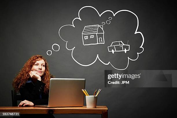 woman dreaming of new house and car - dreaming of home ownership stock pictures, royalty-free photos & images