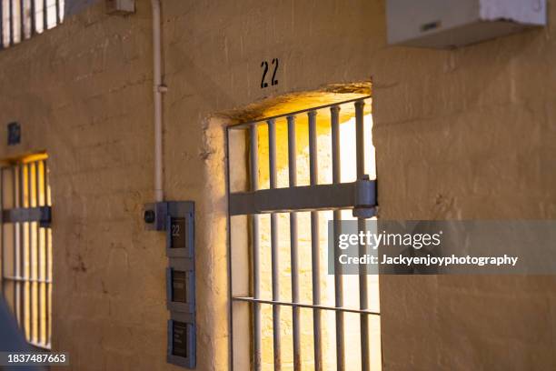 empty prison cell - open prison cell stock pictures, royalty-free photos & images
