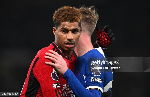 Manchester United player Marcus Rashford embraces Cole Palmer after the Premier League match between Manchester United and Chelsea FC at Old Trafford...