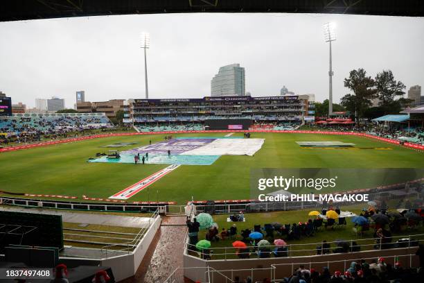 General view of the stadium with covers on the pitch ahed of the first T20 cricket match between South Africa and India at Kingsmead stadium in...