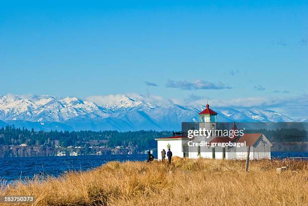 west point lighthouse at discovery park in seattle, wa - seattle discovery park stock pictures, royalty-free photos & images