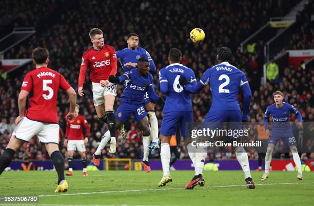 Scott McTominay of Manchester United wins a header whilst under pressure from Moises Caicedo and Levi Colwill of Chelsea during the Premier League...
