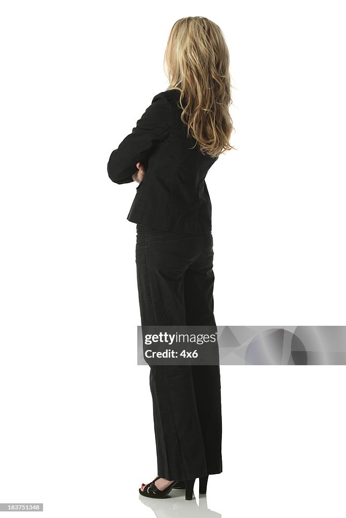 Businesswoman standing with arms crossed