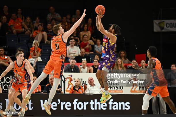 Jaylen Adams of the Kings shoots under pressure from Sam Waardenburg of the Taipans during the round 10 NBL match between Cairns Taipans and Sydney...