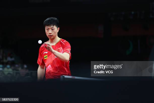 Ma Long of Team China reacts in the group match against Lin Yen-Chun of Team Chinese Taipei during ITTF Mixed Team World Cup Chengdu 2023 at Sichuan...