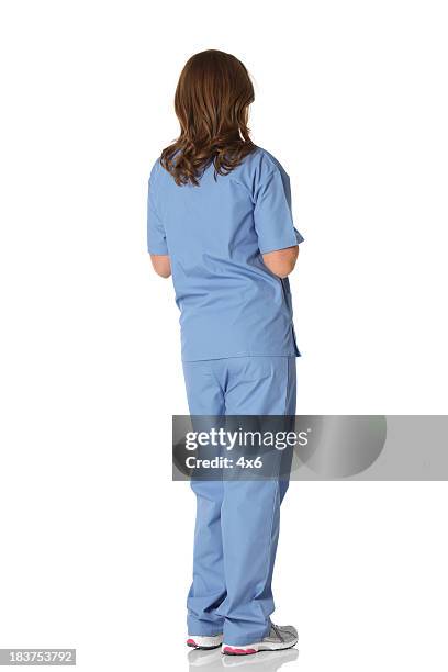 rear view of a female nurse - nurse full length stock pictures, royalty-free photos & images