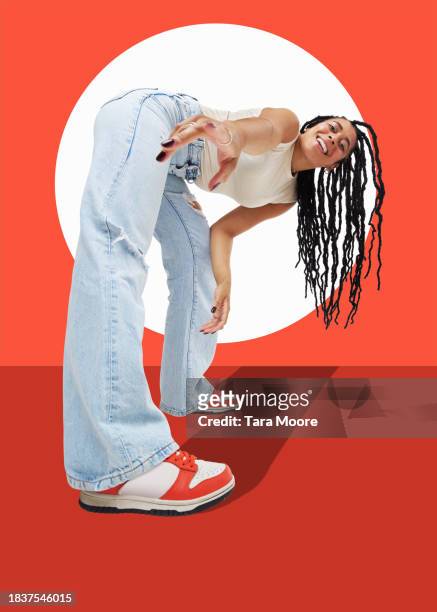 portrait bending over - one mid adult woman only stock pictures, royalty-free photos & images