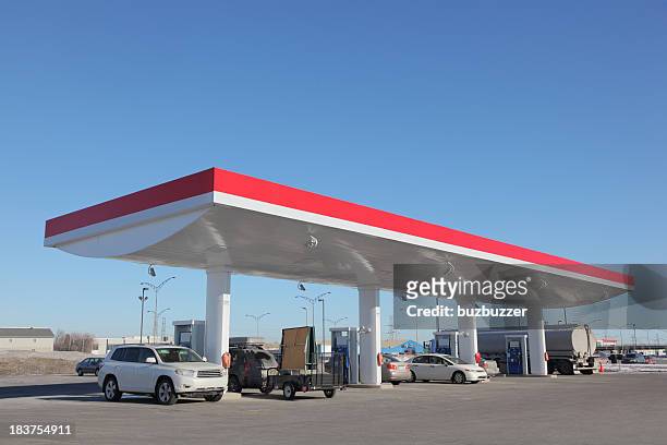 modern gas station with cars refueling - bensinstation bildbanksfoton och bilder