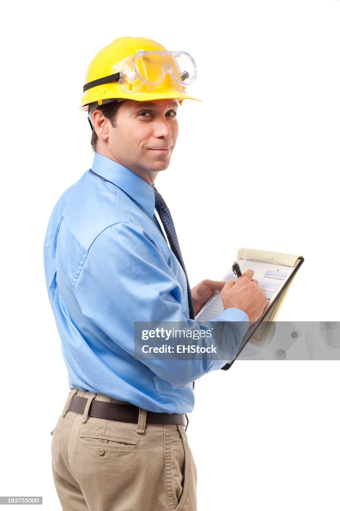 Over-the-shoulder view of contractor in hard hat