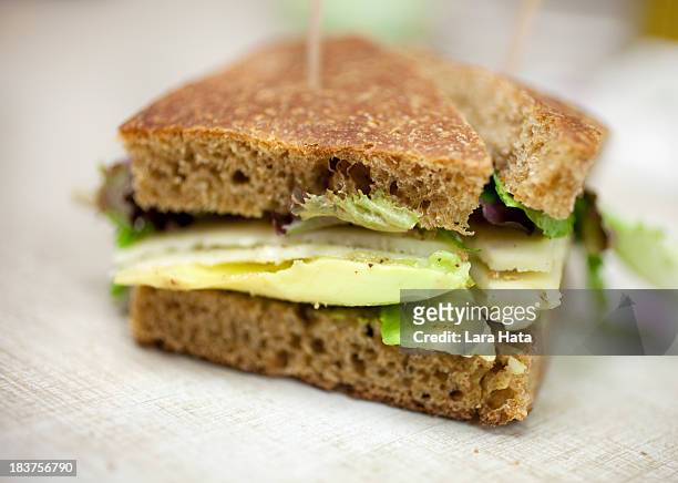 avocado sandwich - whole wheat sandwich stock pictures, royalty-free photos & images