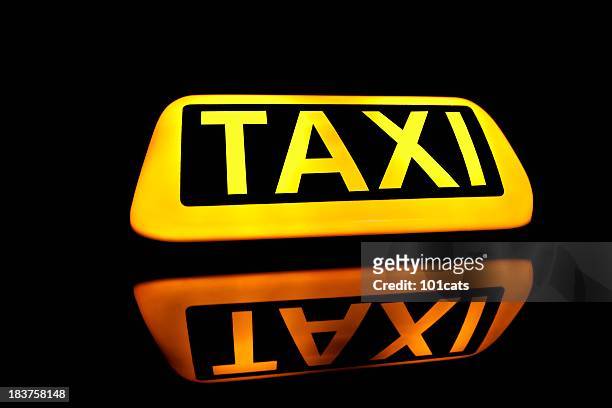 taxi sign - taxi sign stock pictures, royalty-free photos & images