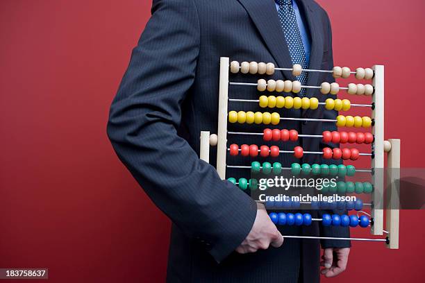 business man with an abacus - abacus old stock pictures, royalty-free photos & images