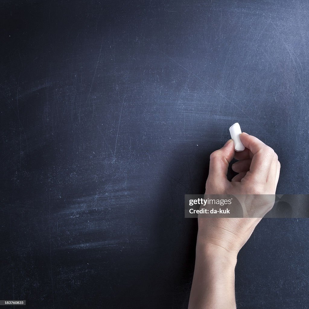 Writing on blackboard