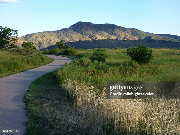 sunrise over state park grasslands and foothills colorado - foothills stockfoto's en -beelden