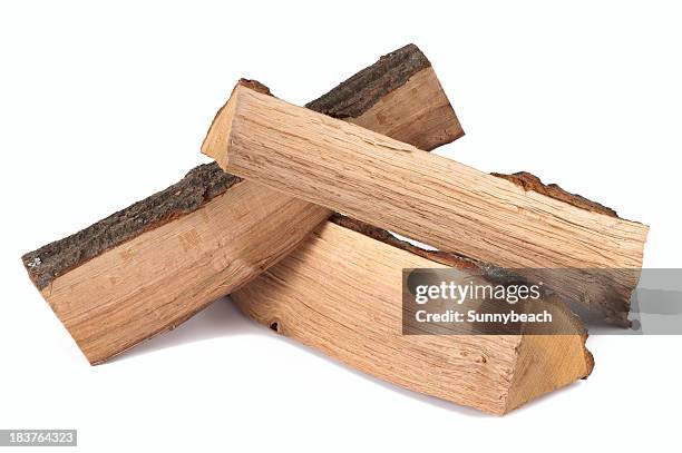 stack of three cut logs with bark - firewood stock pictures, royalty-free photos & images