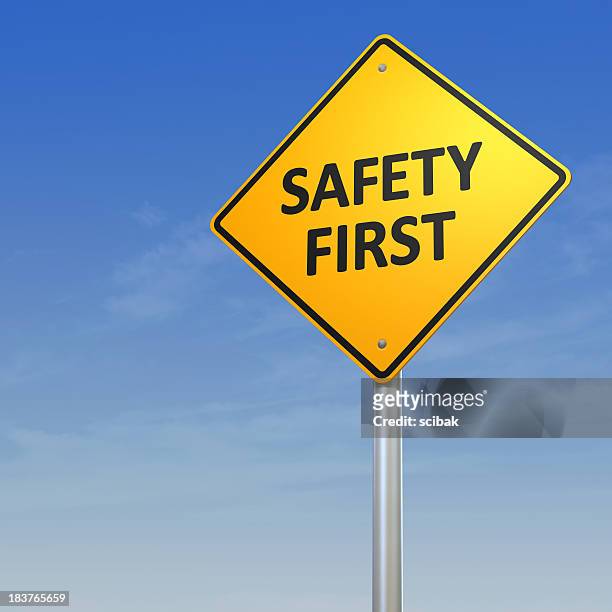 safety first warning sign - safety stock pictures, royalty-free photos & images