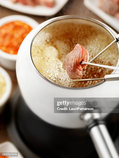 beef fondue - beef cubes stock pictures, royalty-free photos & images