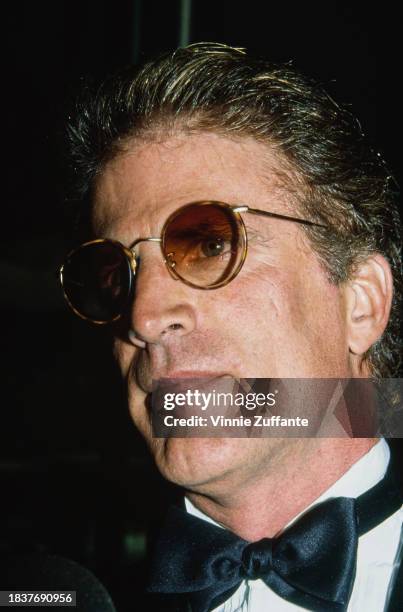 American actor Ted Danson, wearing a tuxedo and bow tie, in the press room of the 2nd Annual Screen Actors Guild Awards, held at the Santa Monica...