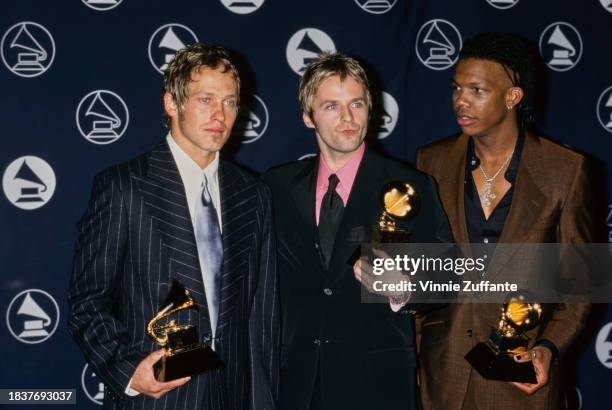 American Christian rap and rock band dc Talk in the press room of the 39th Annual Grammy Awards, held at Madison Square Garden in Midtown Manhattan,...