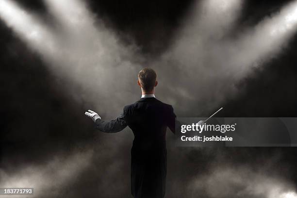 orchestra conductor - maestro stock pictures, royalty-free photos & images