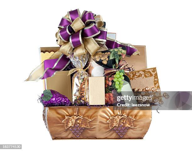 wine-themed gift basket with purple and gold bow - wine basket stock pictures, royalty-free photos & images