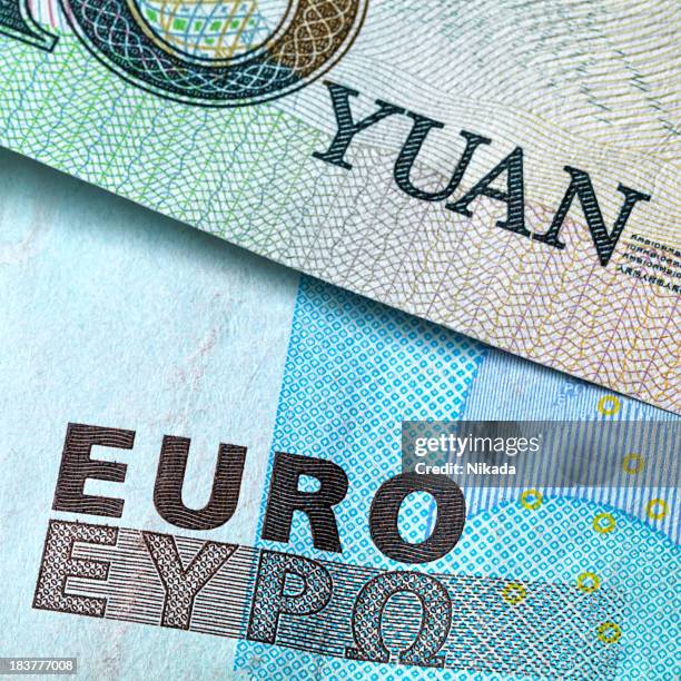 euro and yuan - china european union stock pictures, royalty-free photos & images