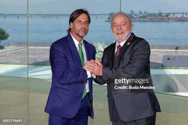 Brazilian President Luiz Inacio Lula da Silva pose for photographers with Luis Lacalle Pou, President of Uruguay during the 63rd Summit of Heads of...