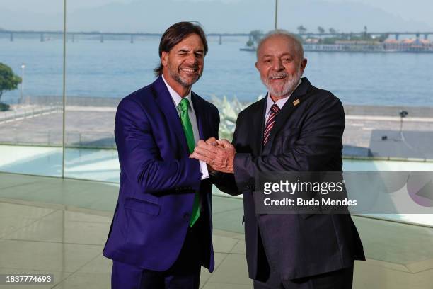 Brazilian President Luiz Inacio Lula da Silva pose for photographers with Luis Lacalle Pou, President of Uruguay during the 63rd Summit of Heads of...