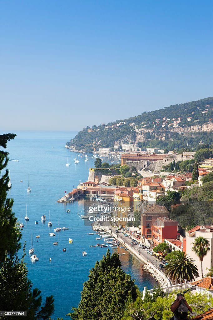 Villefranche-sur-Mer filled with boats off the shoreline