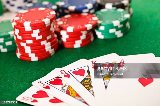 poker, royal flush and gambling chips. - casino stock pictures, royalty-free photos & images