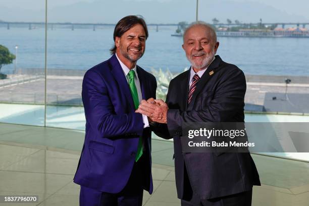 Brazilian President Luiz Inacio Lula da Silva poses for photographers with Luis Lacalle Pou, President of Uruguay during the 63rd Summit of Heads of...