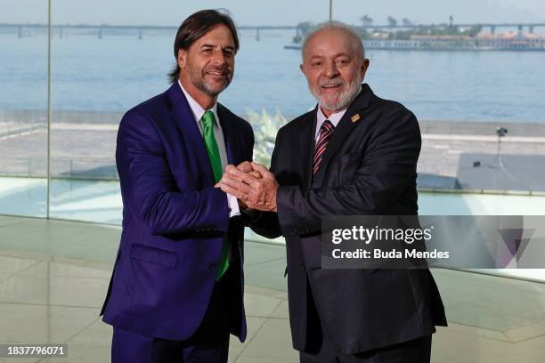 Brazilian President Luiz Inacio Lula da Silva poses for photographers with Luis Lacalle Pou, President of Uruguay during the 63rd Summit of Heads of...