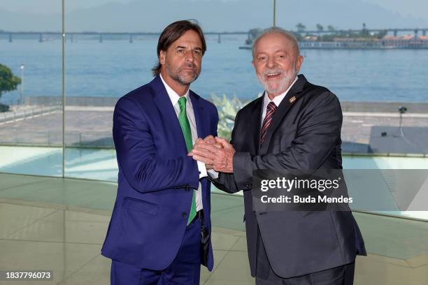 Brazilian President Luiz Inacio Lula da Silva poses for photographers with Luis Lacalle Pou, President of Uruguay during the 63rd Summit of Heads of...