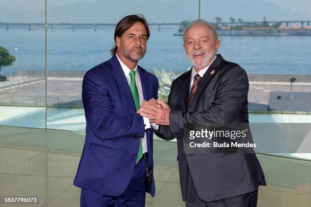 Brazilian President Luiz Inacio Lula da Silva poses for photographers with Luis Lacalle Pou, President of Uruguay during the 63rd Summit of Heads of...
