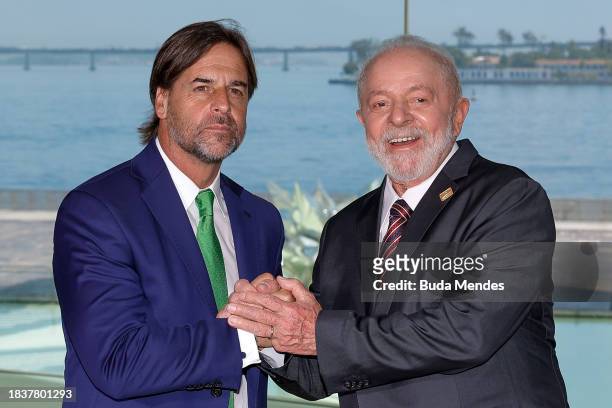 Brazilian President Luiz Inacio Lula da Silva poses for photographers with Luis Lacalle Pou, President of Uruguay during the 63rd Summit of Heads of...