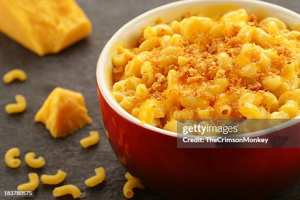 baked macaroni and cheese - mac and cheese stock pictures, royalty-free photos & images