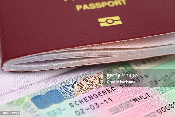 schengen visa and passport - immigration stamps stock pictures, royalty-free photos & images