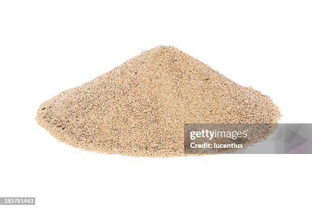 pile of dry sand on a plain white background - heap stock pictures, royalty-free photos & images