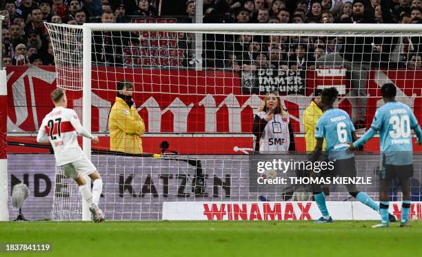 Stuttgart's German midfielder Chris Fuehrich scores the opening goal during the German first division Bundesliga football match between VfB Stuttgart...