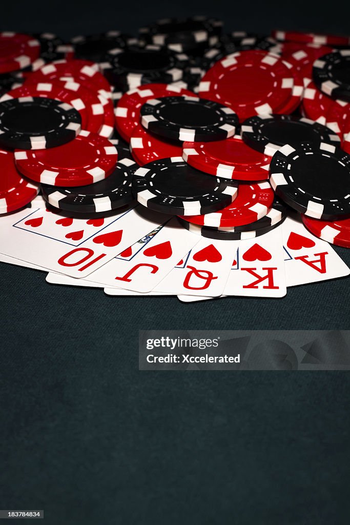 Royal Flush with Black and red Poker Chips