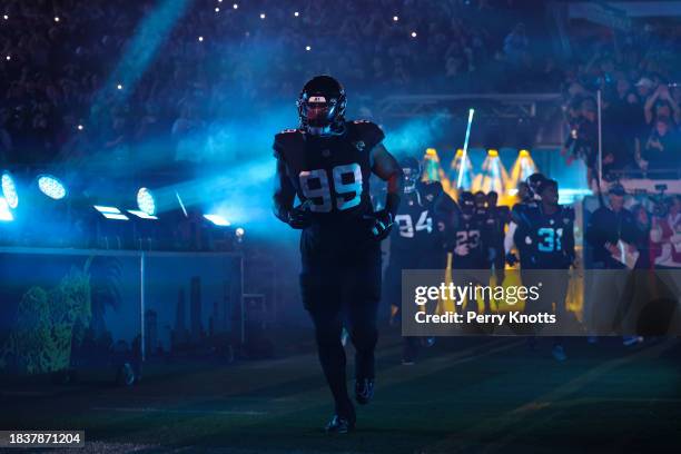 Jeremiah Ledbetter of the Jacksonville Jaguars runs out of the tunnel prior to an NFL football game against the Cincinnati Bengals at EverBank...