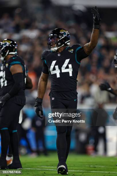 Travon Walker of the Jacksonville Jaguars reacts during an NFL football game against the Cincinnati Bengals at EverBank Stadium on December 4, 2023...