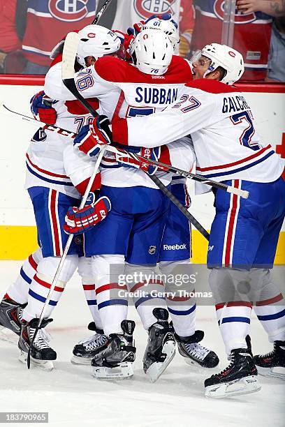 Subban and teammates of the Montreal Canadiens celebrate a goal against the Calgary Flames at Scotiabank Saddledome on October 9, 2013 in Calgary,...